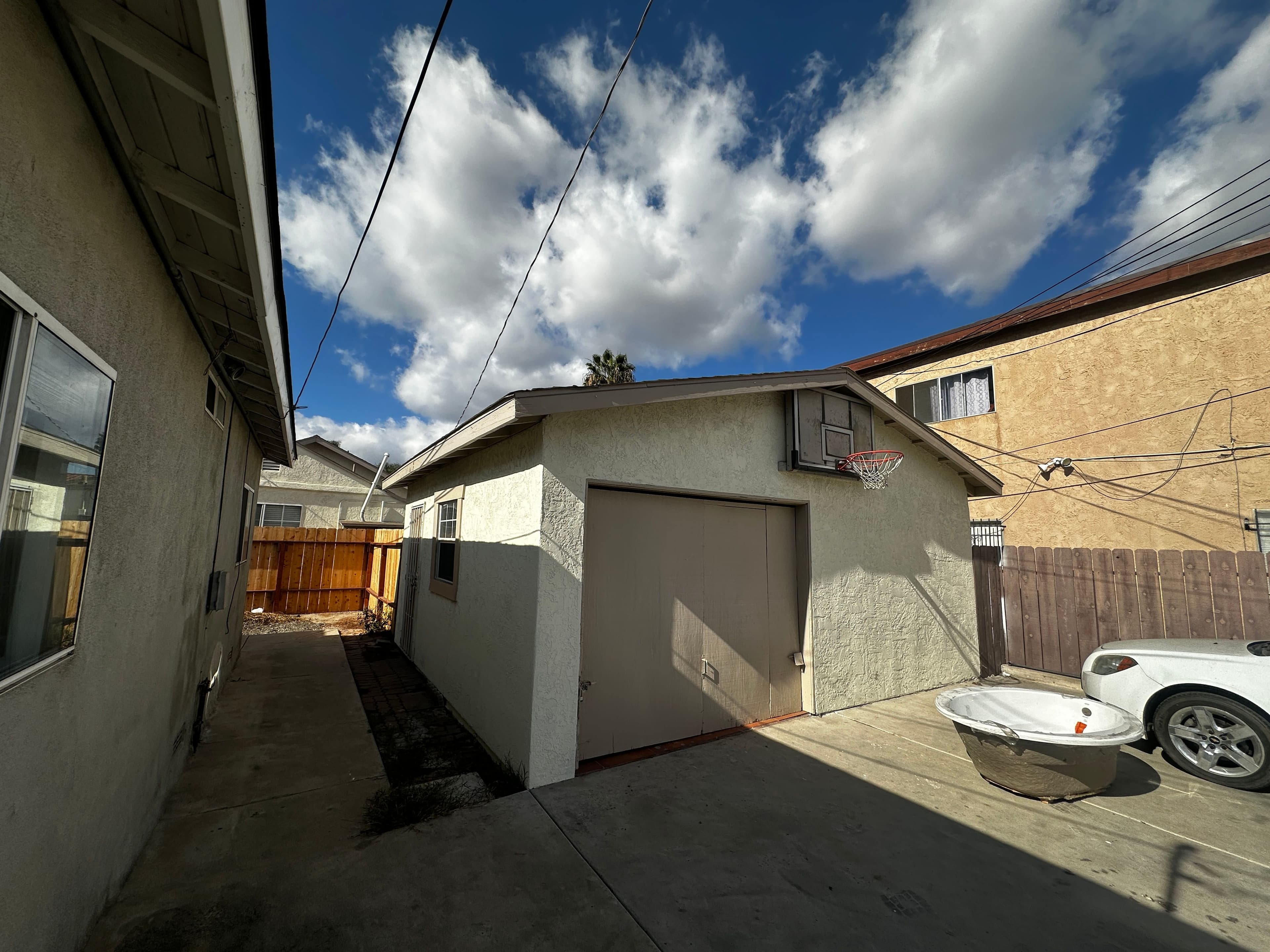 Detached garage seen from the backyard before the ADU conversion